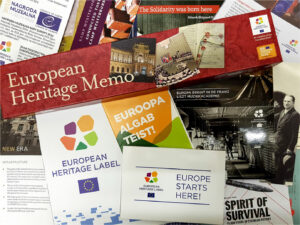 Image Of A Pile Of Information Brochures, Flyers, And Promotional Material From Various Ehl Sites In Multiple Languages